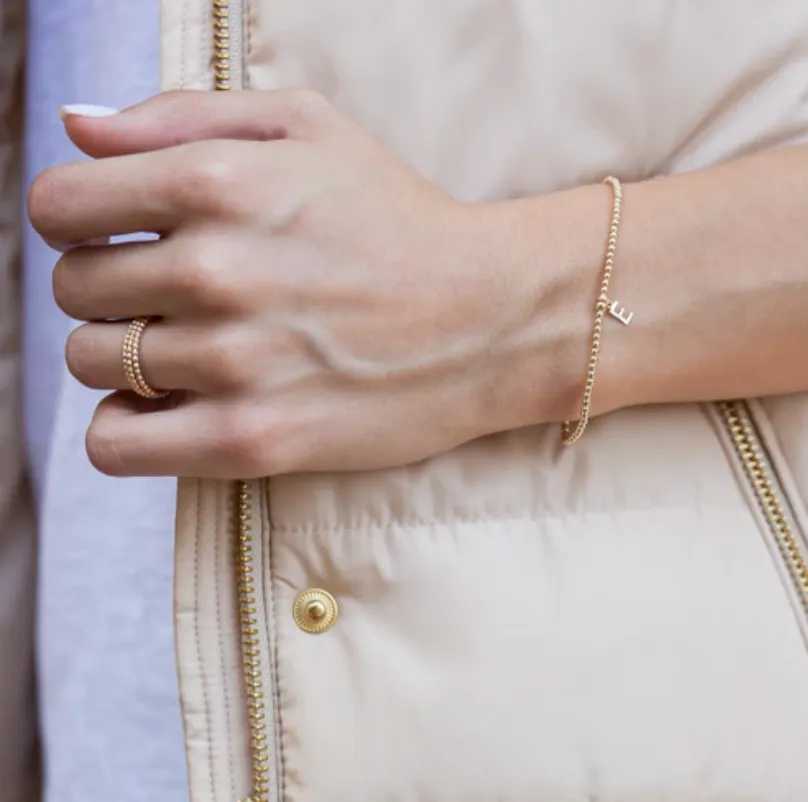 classic gold 2mm bead bracelet - respect gold charm